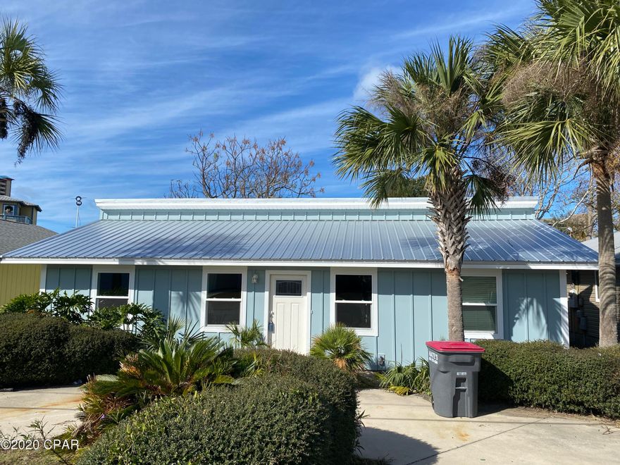 Less than a thousand feet to The Beach. You will love this remodeled Panama City Beach Home! The 3 Bedroom 2 Bath home has a new roof, Fresh Paint, Some Windows & Doors Replaced and New Hardie Board Siding. Walk to the Beach, Shopping & Restaurants. The Kitchen is good sized with granite counter-tops, breakfast bar & a Separate Ice Maker. There is a Wonderful Florida Room on the back with plenty of Sunshine and New Vinyl Plank Flooring.  Professional Photo's a coming. This would make a wonderful 2nd home or Primary Home. Call your agent today to schedule a showing. All ages, Measurements and room sizes are approximate. Please Verify if important.