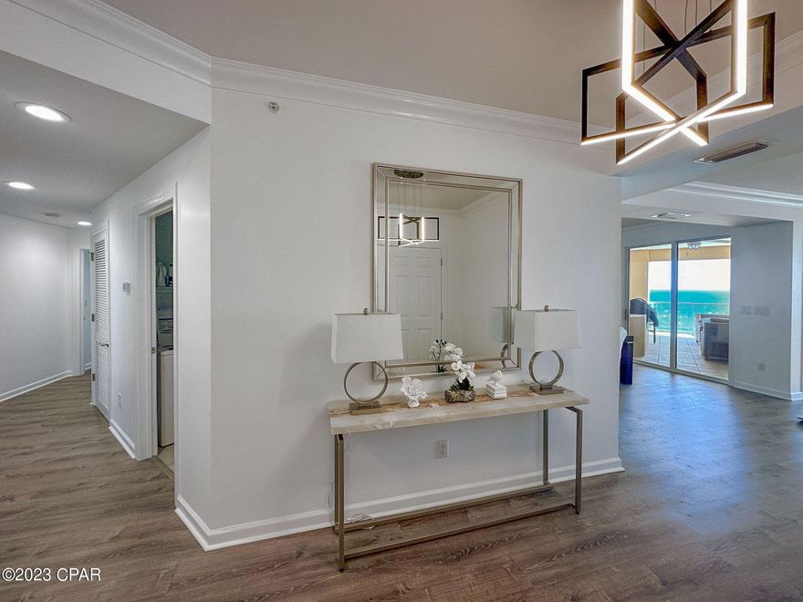 En Soleil is the most luxurious Gulf Front Condominium that Panama City Beach has to offer. This west end unit has been professionally decorated and completely updated. In addition to the 2300+ sq ft condo you will also enjoy your own private outdoor living area with a built-in gas grill to enjoy the breath-taking views of the Gulf of Mexico. The master bedroom overlooks the gulf and includes a separate shower, garden tub, and walk-in closet. Stainless steel kitchen appliances, 9' ceilings, crown molding, and recessed lighting. With only 3 units per floor, En Soleil offers privacy to all owners. With resort-style amenities including a magnificent sun deck, owner's lounge, 6,500 square feet of gulf front pools, gulf front fitness center, underground parking, additional outdoor parking, and 24 hr. security. Parking spot # 5.  Perfect for your new beach home or rental! . Call your realtor today to see this GREAT property.