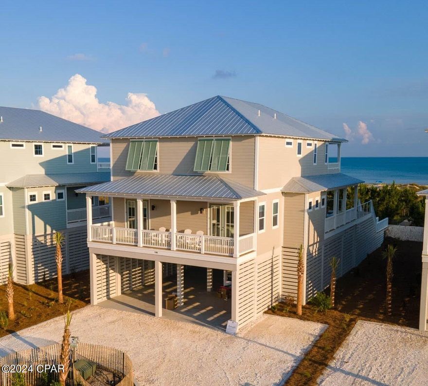New 2023 Construction! Elevated Pool With Oceanfront Views!

With two large decks overlooking the Gulf, your own private pool, and the sugar sand beach and clear blue water just feet away, Amalfi Beach House is the perfect vacation spot in the Villa del Sol subdivision. This 3,300 square foot 5 bedroom 5 bath vacation home owned by Bella Coastal Rentals with an elevated pool and elevator was built in 2023 in a lovely private gated subdivision.

Amalfi truly captures the essence of all things coastal. You will be greeted with a large, open concept living and kitchen space boasting spectacular Gulf views. Take a step through the back doors facing the ocean to find yourself in the peaceful, breezy surroundings with an amazing, unhindered view of the Gulf and your own private elevated swimming pool. Back inside, the dining and kitchen area has beautiful hardwood floors, modern amenities, and a kitchen featuring a large island, appliances, and quartz countertops. The comfortable, roomy living space is the ultimate gathering spot for entertaining and making memories with friends and family.

The first floor has a 1 bay view master suite with a king bed and attached private bathroom along with a bay view master bedroom with king bed. On the second floor, there are two Oceanfront master suite bedrooms with king beds and attached bathrooms, and a charming bunk room with 3 bunks and a full bathroom. The most inviting aspect of the second floor is that two of the bedrooms have access to its large deck overlooking the Gulf, while the bunk room has views of the bay.

Walk down your own boardwalk from your coastal home and you'll find yourself on the miles and miles of sugar-white sand and pristine blue water of the Gulf of Mexico. Whether you enjoy combing the beach for shells, snorkeling, kayaking, sunbathing, surfing waves, fishing, or taking a leisurely stroll or horseback rides along the shoreline, you'll spend hours of fun while soaking up the sun. Venture out to enjoy shopping, galleries, entertainment, and restaurants in the quaint downtown of Port St. Joe located only 15 minutes away. Visit the historic lighthouse, visit the shops, have lunch or dinner, or take the ferry over to St. Vincent Island for the day. For the fishing enthusiast, launch your boat at the nearby Indian Pass boat ramp and take in some first-class fishing, or book your family on a fishing charter for a day trip out on the water to catch your dinner for the night. When you want to experience the beauty of St. Joseph Bay, visit nearby Salinas Park with a playground, picnic table, fire pit, and boardwalk over the serene water. You can even get in some exercise by walking, running, or biking on the 19-mile paved trail. About 25 miles away is the quaint, historical, fishing community of Apalachicola. Apalach is perfect for a day trip to do a little shopping, stroll along the Apalachicola River, or grab some of the best seafood around!
The Space
Ground Floor
 • Parking for 5 vehicles in driveway
 • Elevator
 • Ice Machine

First Floor
 • Living Room
 • Dining Room
 • Kitchen
 • Laundry Room
 • 1 Master Bedroom with King Bed and Deck with Bay Views
 • 1 Full Bathroom
 • 1 Master Suite with King Bed and Deck with Bay Views
 • Deck with Private Pool

Second Floor
 • 2 Oceanfront Master Suites with King Beds and Deck and full Oceanfront views
 • 1 Bunk Room with 3 bunk beds - 2 bunk beds with Full over Queen mattresses and 1 bunk bed with twin over twin mattresses with an attached full bathroom with shower/tub

Neighborhood
Villa del Sol has Gulf and Bay views and is just steps to pet friendly beaches & St Joseph Bay. Neighborhood amenities include gated entrance, brick paved streets, boardwalk beach access, a community pool and two pickleball courts. Kayak & fish from the shoreline or walk the beach for seashells & wildlife. Visit nearby family friendly Salinas Park for pickleball courts & horseback riding or trek  & bike trails
