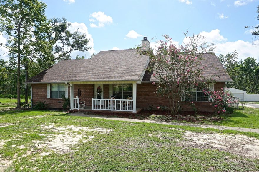 'CURRENTLY UNDER CONTRACT, SELLER ACCEPTING BACKUP OFFERS'   .Beautiful 3 bedroom 2 bath home located in the desirable neighborhood of Indian Springs.  This home features a vaulted ceiling and wood burning fireplace in the living area, spacious kitchen open to dining area., split bedroom plan with all three bedrooms featuring walk in closets.  The Master bedroom has a huge (20' X 7') walk in closet.  Back deck with a sink and 2 car carport area perfect for outdoor living.  An additional detached garage/storage building.  Make an appointment today to see this lovely home.   Roof was replaced after Hurricane Michael.  No trees on house, just missing shingles due to wind.