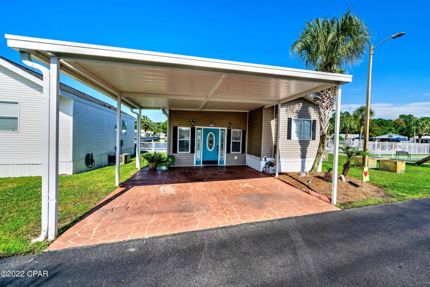 CURRENTLY UNDER CONTRACT, SELLER WILL CONSIDER BACKUP OFFERS - Perfect Get-Away with a beautiful view! This is your opportunity to own an updated, turnkey unit at Emerald Pointe Resort, one of the highly sought-after communities in Panama City Beach. The home is being sold furnished with a large living room addition, large master addition as one of the 2 full-size bedrooms, 2 bathrooms, split floor plan, outside storage, laundry room, just steps to the pool, AND a screened in patio that OVERLOOKS the quiet community lake. Recent updates include paint, furnishings, LVP flooring, metal roof and AC. The home is move in ready, and perfect for a primary, vacation or investment property. Ask your agent for the small list of items excluded from the sale. Emerald Pointe Resort is a golf cart -Cont friendly community located in the heart of Panama City Beach close to restaurants, shopping, and the world's most beautiful beaches. Amenities include a large clubhouse, exercise room, 2 pools (one heated seasonally), hot tub, lake with boardwalk, and shuffleboard court. HOA fee includes water, sewer, garbage, cable, and lawn service. All information is approximate and should be verified by buyer if important.