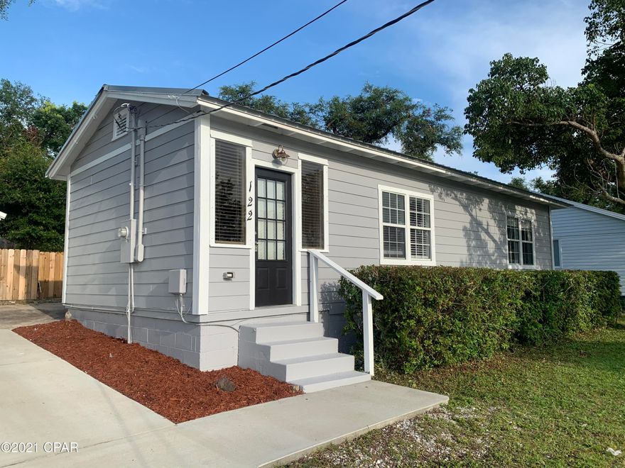 Adorable updated Florida Cottage in the heart of the most sought after neighborhood in Bay County, The Cove.  The historic Cove neighborhood is nestled right beside Historic Downtown Panama City.  The home has brand new exterior paint, along with some updates such as kitchen, windows, Hardie Board siding, roof and driveway.  The home is adorable and is perfect for a vacation home, someone downsizing, first time home buyer, or investor.  The detached garage has plumbing and a toilet and could easily be converted into a mother-in-law quarters, hobby room or a great shop.   This home is a jewel of a find and at a price for a quick sale.