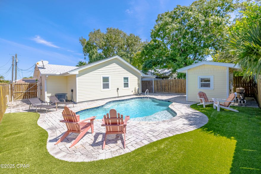 Here is your perfect getaway at this charming 2 bedroom/2 bath abode with swimming pool & just minutes from the sugar white sands and emerald waters of Panama City Beach. Enjoy swimming,fishing, kayaking, parasailing, Dolphin Excursions etc.  Easy access to local attractions, nightlife & walks on the beach at Sunset.This home is well maintained and newly painted as well.

Nestled in the heart of Panama City Beach, this property offers the perfect blend of relaxation and convenience whether you're looking for a permanent residence, vacation getaway or company retreat.  Don't miss your chance to own a piece of paradise-schedule your showing today and start living the beach lifestyle you've always dreamed of & start building unforgettable memories with family and friends now.