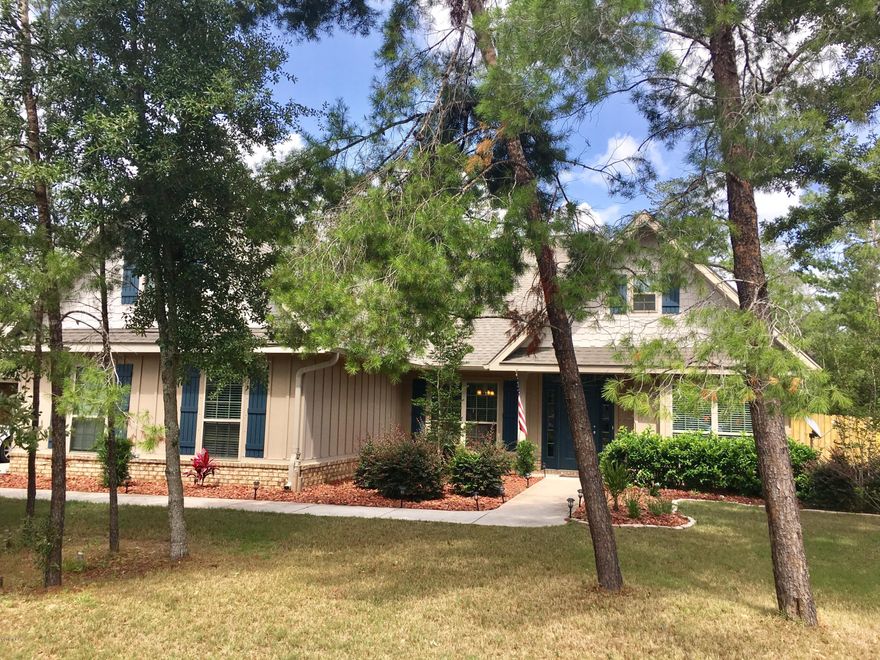 NEW LISTING in the beautiful Lake Merial Subdivision! Subdivision has a gated entrance with night time security. This home is a must see!  It has an open concept kitchen and family room design with vaulted ceiling.  It is very spacious and also has separate formal living or office space and a formal dining room.  The bedrooms are large and one could be used as a bonus room.  The back yard is fenced and gutters have recently been installed on the home.  Call for a showing today. This home won't last long!