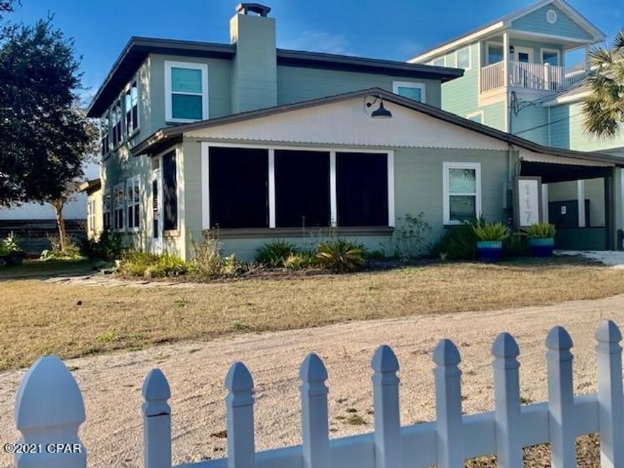 CURRENTLY UNDER CONTRACT. SELLER ACCEPTING BACK UP OFFERS.  Looking for that ''Authentic'' Old Florida feel....This one is it!  1/2 BLOCK FROM THE BEACH on an OVERSIZED LOT in highly desirable WEST END neighborhood.  This amazing spacious 5 bedroom beach cottage has room for everyone, and owners have gone over and beyond to make sure every detail has been provided for a perfect beach getaway.  2 Large living areas, one on each floor, wood burning fire place. well designed kitchen with extra large bar area seating 8, screened front porch, wonderful outdoor living space, 2 outdoor showers, and plenty of room for a pool!  Current owners have done all the important upgrades to bring this authentic Floridian cottage up to current day standards and present to you in immaculate condition.   They have done the work.....now time for you to enjoy. Dimensions are approximate and should be verified by buyer as deemed important