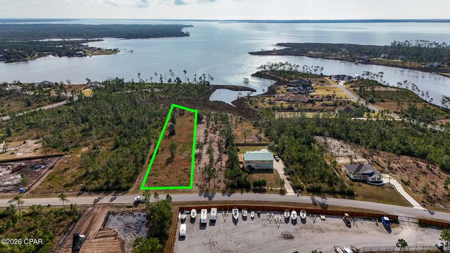Looking for a large waterfront (1.4 acre) lot with deep water access to build your DREAM HOME? The gated community of. Laird Bayou offers a community pool, RV/Boat parking, and its very own private boat launch and extra parking. This property features deep water access to East Bay and the Gulf of Mexico. Ideal for fishing, boating, and water sports. The lot is cleared and ready for the construction of your new home. This prestigious neighborhood is a conveniently located just 15 minutes from Tyndall Air Force Base, close to shopping, dining & more!  Buyer should verify all measurements, zoning, utilities and other necessary information regarding the property