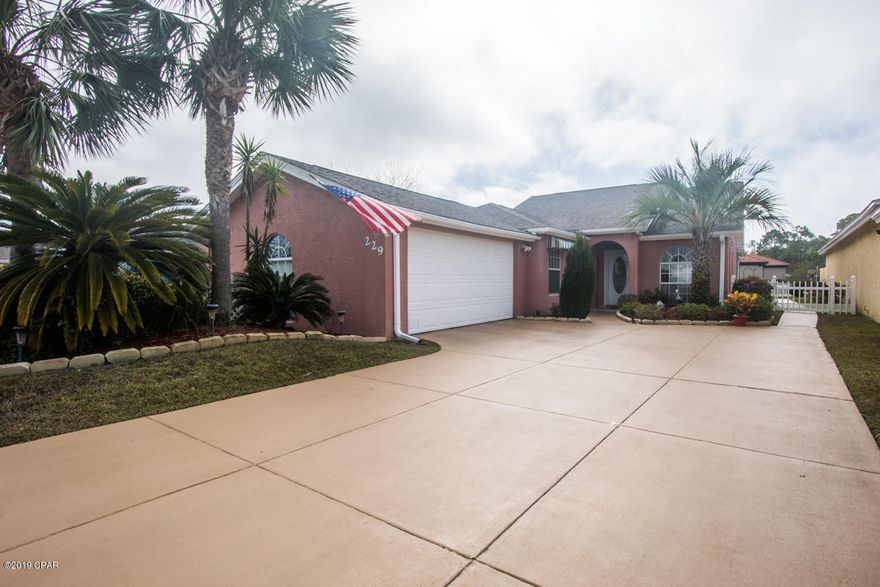 '~~Motivated Seller~~' The beautiful patio home is move in ready. The home has a split Three bedroom floor plan with , 2 bath, and a enclosed patio with screen enclosed pool. There is a good distance to the home located behind this house. There is a large pond behind the home so you don't have to worry about the property behind you being turned into something not desirable. The dining room has  a custom painted beach scene that brings the beach inside.