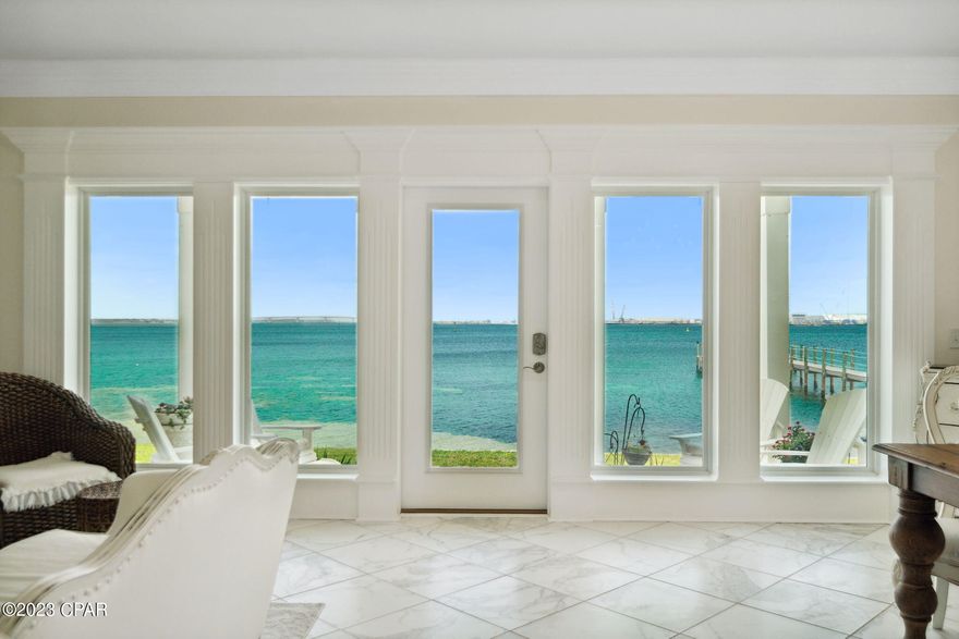 Don't miss this rare opportunity to own a slice of paradise! Visit our open house and imagine yourself living in this exceptional waterfront oasis.

Welcome to this stunning luxury bayfront 3BD/2.5BA townhome on St. Andrews Bay, offering a Million Dollar View. The pictures truly speak for themselves, showcasing the incredible beauty of this property. The home features high 9' ceilings and tile throughout, along with a 2-car garage and a security system. The master bedroom offers a breathtaking view and has its own balcony. The property also includes convenient long docks, allowing you to easily pull up your boat and enjoy trips to the exquisite beaches and Shell Island. Whether you prefer fishing by boat or simply relaxing on the dock, this location has it all!
This prestigious Pelican Bay community boasts a clubhouse, pool, hot tub, and two docks. The addition of a 7-acre preserve area with a Nature Walk adds to the unique appeal. Furthermore, you'll find various amenities just minutes away, including restaurants, grocery stores, urgent care, marinas, St. Andrews Park and lots more! Don't miss out on this incredible opportunity - it's definitely worth a closer look!