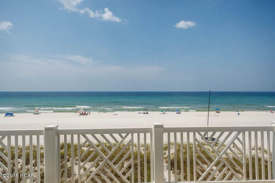 Gorgeous 5 bedroom 3.5 bath home within steps of the Gulf! This home features panoramic views of the sparking white sand beaches! Inside you'll find spacious living on 4 levels! The main level has 2BR/1BA and a two car garage. 2nd level boasts a nice size living area with built-in shelves, entertainment center and fireplace. The well appointed kitchen features granite counters and SS appliances with lots of cabinet space. This is an open floor plan with dining right off the kitchen with additional seating at the long breakfast bar. On the 3rd level you'll find the master suite and 2 additional bedrooms and a bath. Level 4 features panoramic views of the beaches with continuous windows. An outside deck gives a bird's eye view of the sugar white sand and emerald green waters.