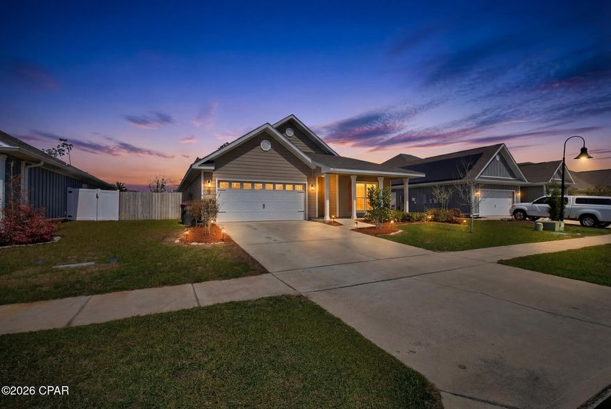 Welcome to this beautiful 4-bedroom, 2-bath home in the sought-after Bridge Harbor community, just minutes from Tyndall AFB. Inside, you'll find granite countertops, stainless steel appliances, and blinds throughout, along with an electric fireplace insert and  a mantle that adds warmth and character to the living space. The spacious primary suite features a custom built-in shelf and bench seat with hidden storage, along with a well-appointed bathroom offering double vanities, a walk-in shower, and two walk-in closets for plenty of storage. Step outside to enjoy the large backyard with a 6-foot privacy fence, perfect for relaxing or entertaining. The extended covered porch with pergola creates an ideal outdoor living space and is complete with a gas fireplace, making it perfect for gatherings year-round.
Additional highlights include a 2-car garage with epoxy-coated floors, hurricane shutters on all windows and doors, and plenty of storage throughout the home. The Bridge Harbor community offers amenities including a resort-style pool with BBQ grilling area and a pathway to the bay, ideal for kayaking and paddle boarding. Home is located in flood zone X. *Make sure to check out the video.*
