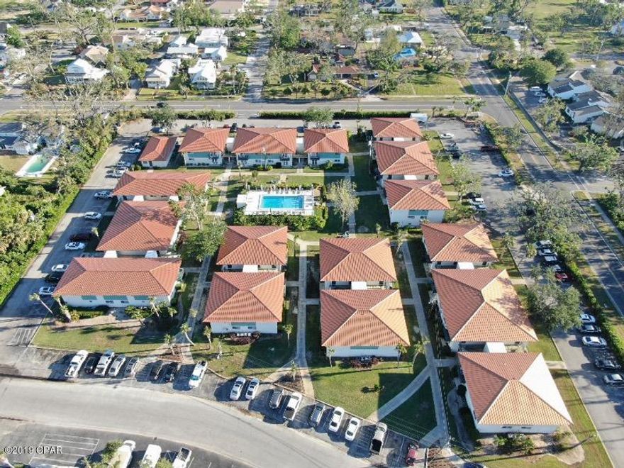 Wonderful Investment or Second Home!  Partially upgraded 2 bedroom, 2 bath unit has new laminate wood flooring in the bedrooms, crown molding, new paint and a new roof.  Views of St. Andrews Bay from the bedrooms and private balcony.  Quiet, well-maintained community of Landmark is undergoing renovations due to Hurricane Michael, giving the property needed improvements.   All measurements aprox.