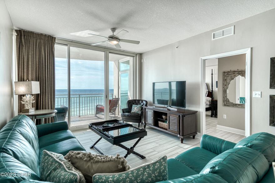 Welcome to Aqua Condo #503 in Panama City Beach, Florida!! Two Large Beachfront Bedrooms with access to a comfortable, bow shaped balcony with clear glass railings offering extraordinary views make this one of the best floor plans anywhere on the beach! The open kitchen, dining, living space also features excellent views and balcony access while a 3rd bedroom with en-suite bath is also offered in this popular plan. These condos are true rental magnates and Aqua is one of the premier developments on Panama City Beach's west end just 1/4 mile to all of the activities at Pier Park. Aqua offers all of the amenities you need with two gulf front pools, hot tub, gulf front fitness center, covered parking, community room, tropical landscaping and more!  Come see this beauty today!