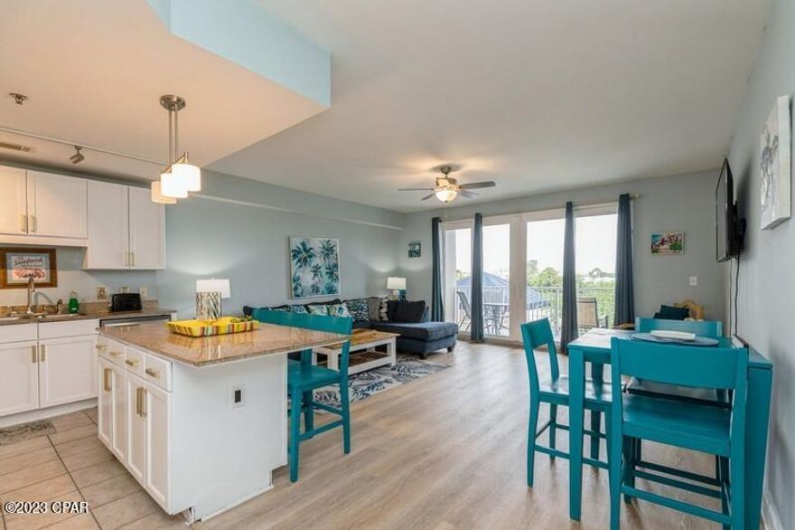 MOTIVATED SELLER!  BRING ALL OFFERS! 
 RENTAL MACHINE...This unit grossed $31K from 4/25/23 to 3/1/23 with $11K on the books already for this summer!  NO WAITING ON ELEVATOR!  NEW HVAC 3/23.  Completely updated with white cabinets and vinyl plank flooring.  Walking access to 24 hour Walmart, golf, attractions and beach!  Laketown Wharf offers 5 pools, beach access, gulf views fitness center, restaurants on site and covered parking.