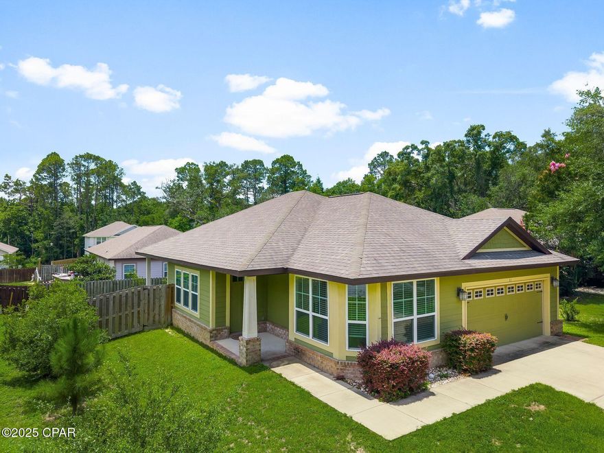 Discover this delightful 3BR/2BA Craftsman Cottage nestled in the desirable Canopies of Freeport community! Situated on a peaceful cul-de-sac lot in the heart of Freeport, this freshly painted home welcomes you with 9' and vaulted ceilings, sleek granite countertops, and stylish, durable vinyl plank flooring throughout.

Step outside to enjoy your beautifully landscaped, fenced yard, perfect for relaxation or play. The cozy covered back porch adds an inviting touch for outdoor gatherings.

The Canopies community offers fantastic amenities, including a pool and playground, all with a budget-friendly HOA.

You'll love the convenient location with easy access to local shopping, top-rated schools, and just 15-20 minutes away from the white sandy beaches!

Don't miss your chance to own this charming Craftsman Cottage that offers comfort, style, and an unbeatable location. Schedule your showing today!