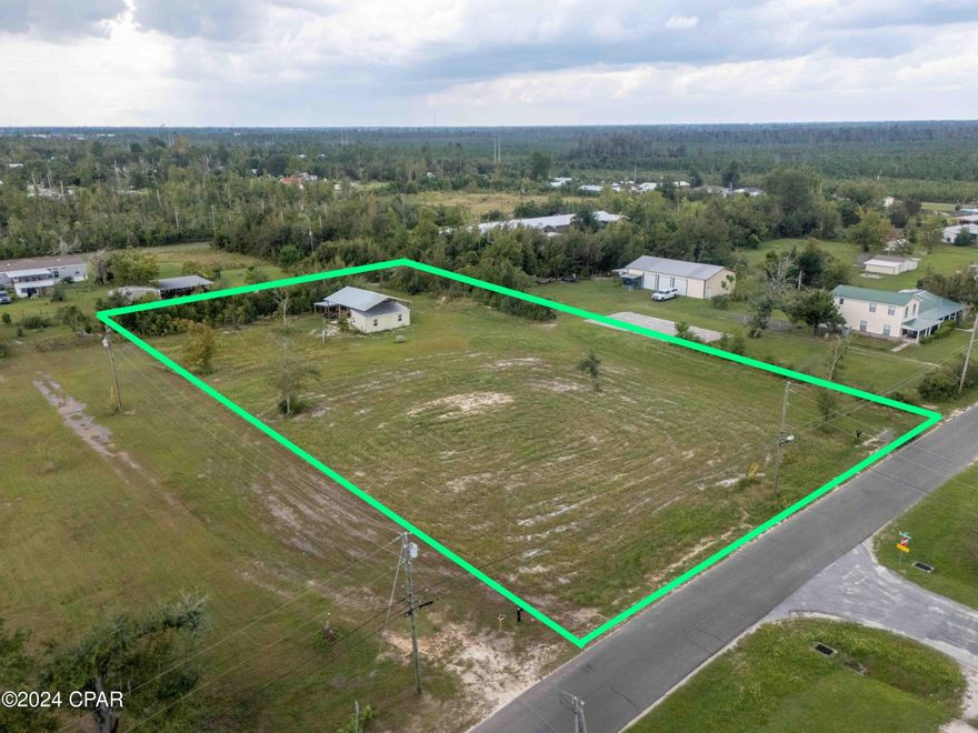 Over 1 acre of residential land with a new pole barn and storage shed included. Excellent opportunity to build spec homes, rentals or a large homestead. Flood zone x per Bay PA.