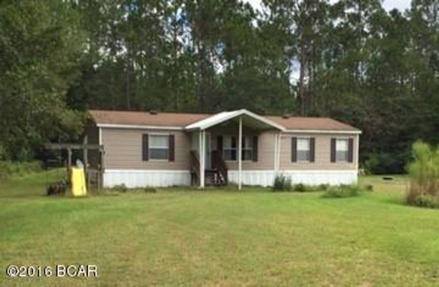 PRIVACY AND GOOD COUNTRY LIVING! THIS IS A WELL KEPT ACRE OF LAND WITH A VERY NICE DOUBLE WIDE AND A POND. LARGE OPEN KITCHEN AREA, LAUDRY ROOM. DRIVE UP THE ROAD AND THE HOME IS AT THE END AND LOOKING GOOD! IF YOU'RE LOOKING FOR A VERY NICE, WELL PRICED, MOBILE HOME ON A NICE PIECE OF LAND WITH LOTS OF PRIVACY....THIS IS IT ....MAKE AN APPOINTMENT TO SEE IT BEFORE SOMEONE ELSE BUYS IT!   AGE, TOTAL SQFT, AND ROOM MEASUREMENTS ARE APPROXIMATE AND BUYER NEEDS TO VERIFY IF IMPORTANT - WE WILL BE REVIEWING AND VERIFIYING.