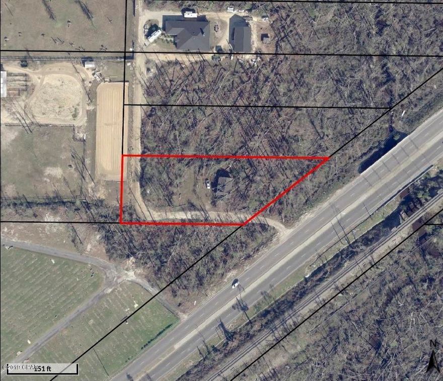 Huge price adjustment .... Parcel qualifies under Commercial zoning! ITS A GREAT LOCATION FOR A BUSINESS, AND GREAT POTENTIAL TO HAVE A SMALL ACREAGE CLOSE TO ALL.   RIGHT OFF 231 AND CLOSE TO I-10.

IT HAS A SMALL DWELLING THAT WAS DAMAGED BY HURRICANE MICHAEL.  OWNER WANTS TO SELL IT AS IS.  LITTLE OVER 1 ACRE .  VALUE IS ON THE LAND ONLY.  GO SEE IT.