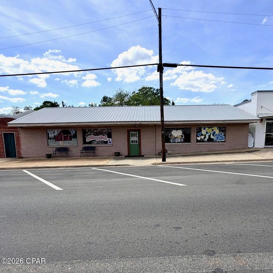 Welcome to an incredible commercial opportunity in the heart of Malone, Florida--where small town charm meets big potential. This established restaurant space is ready for its next owner, whether you continue the current concept or bring something entirely new to the community.



-Active restaurant tenant already in place - instant income potential

-Spacious dining area with multiple seating arrangements and open layout

-Large custom bar area perfect for gatherings, events, or expanded service

-Fully equipped commercial kitchen with hood system, prep space, and stainless fixtures

-Two guest bathrooms for convenience and compliance

-Multiple storage rooms for inventory, supplies, and operations

-Unique interior with character, local charm, and a laid-back atmosphere customers love

-Outdoor fenced area with picnic tables - ideal for expanding into outdoor dining or events

-Some furniture, fixtures, and equipment negotiable with sale



This property isn't just a building--it's a chance to be part of the growing movement of revitalizing small towns. Malone is the kind of place where good food, good people, and strong community still matter--and businesses like this become staples.



Whether you're an investor looking for income, an owner-operator ready to step in, or someone with a vision to create the next local hotspot!