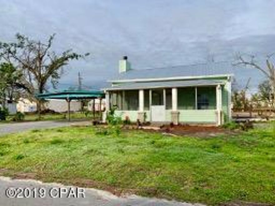 Great opportunity to own a remodeled home that sits on 1/3 of an acre, complete with  a carport, exterior decks, and double gates for access to the large, double lot, with RV hookup.

This home has had the following items replaced new or updated, as it was completely remodeled in 2015: Some electrical wiring, new ceiling fans, some plumbing updated, new flooring , new counters, in addition to recently replaced vinyl siding and some windows. New Roof in 2019. This is a wonderful opportunity for those who desire something with lots of outdoor space for RV, Boat, Cars or anyone who enjoys gardening.  There is plenty of room for a pool. Cash offers please. (All info is approximate.  Buyer to verify any info that is important)