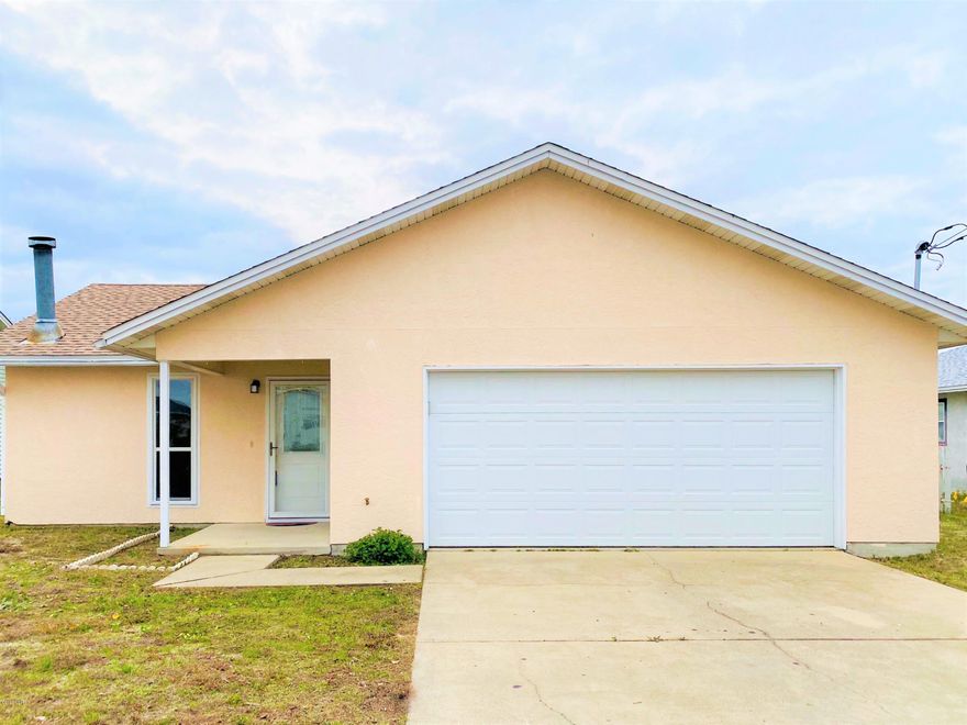 CURRENTLY UNDER CONTRACT, SELLER ACCEPTING BACKUP OFFERS This charming 3-bedroom, 2-bathroom home is waiting to welcome a new family home. The spacious main living area features an inviting, wood-burning fireplace, as well as a spacious Florida Room with ample windows to let in natural light. You'll love this home's layout, which includes a Large Eat-in Kitchen, a Separate Dining Area, an over-sized two-car garage, and plenty of Closet Space for storage. This home is centrally located in Callaway, close to schools, shopping, and just a few minutes' drive to Tyndall AFB. Hurricane repairs have been completed, including new roof, and fresh paint in the interior and exterior; however, the sellers are considering a flooring allowance to replace carpeted areas giving buyers the opportunity to pick out their new flooring.  Call today to schedule a time to see this home in person!