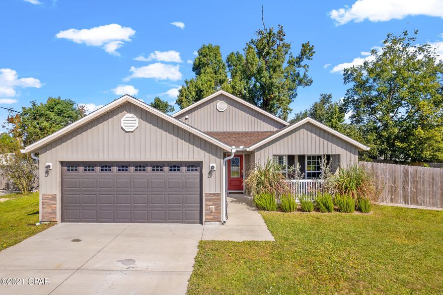 Move-in ready home on a large lot! This single story home has it all. Ceramic tile flooring throughout all main areas and luxury vinyl planks throughout the rest of home, including bedrooms. Open concept living space and a kitchen that offers ample cabinetry, an island, and eat in dining. Just off the dining area are French doors to the back patio, where you can enjoy the large backyard with privacy. Master bedroom features an en suite with double vanities and a beautiful walk in tiled shower. In the hallway there are 2 additional bedrooms, 2nd bathroom, and laundry room. An 8x10 shed in the backyard is also included. Enjoy the cost savings by having a septic and well, that has a peroxide injection system installed.