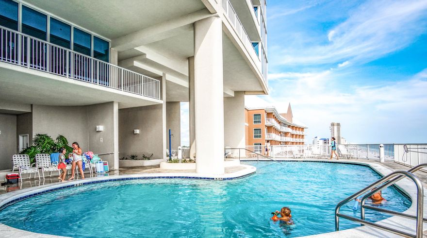 Welcome to Palazzo! This prestigious, fully furnished, 3 bedroom 3 bath condo has been impeccably maintained as it was never used as a rental.  The air conditioner was replaced in 2014 as well as the carpet which is still in perfect condition.  Unit 207 is conveniently located on the same floor as the fitness center making it easy access for your morning workout.  Palazzo amenities include an elevated pool, fitness center, four level parking garage on the same side of the street, and is one of the best maintained buildings along the beach.  Another huge amenity to Palazzo is that you are only 1 mile from Pier Park; the 124 store outdoor shopping center with a Grand IMAX theater, live music venues, and dozens of dining options.  Call today before this one is gone!