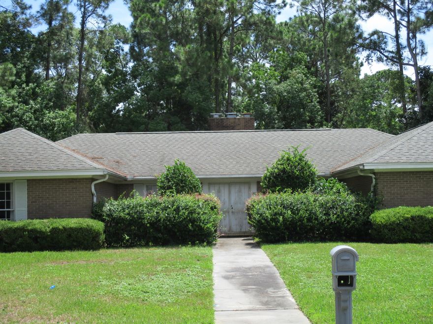 Attention Investors!!!! This a beautiful home in Woodlawn subdivision, with a large corner lot.  The home is large and spacious but is need of TLC.  The home offers a large and spacious living room, a very nice kitchen, a formal dinning room and 4 bedrooms.  There is an in ground swimming pool in the back yard behind privacy fencing.  Unfortunately due to past water intrusion the flooring will need to be completely replaced.  It is not known if the water intrusion has effected any of the walls, but there is a plumbing leak in the half bath located in the laundry room.  This house has been reduced to reflect the necessary repairs.