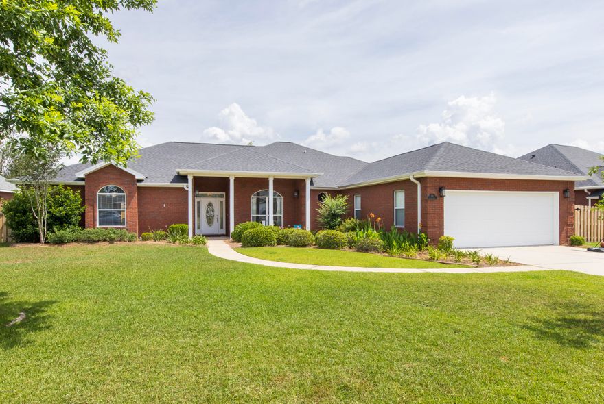 Stunning would be an understatement when describing this all brick dream home!! This breathtaking 3 bedroom, 2.5 bath home boasts over 2,900 sq.ft with two living rooms, a formal dining room or office space, and an oversized laundry room. The ample living space and natural light that flows throughout this home creates the perfect setting for relaxing or entertaining. From the oversized driveway, to the lush landscaping, this home will have you ready to move in the moment you arrive. Special highlights include newly engineered flooring throughout the home, a new roof, new privacy fence, tankless water heater, updated light fixtures inside and out, and an in-ground pool. Bring out your inner chef in this spacious eat-in kitchen fully equipped with a center island, built in oven, breakfast bar, and all new appliances. Enjoy gatherings around the gas burning fireplace in one of your two living areas and on those hot summer days get the family together for fun-in-the-sun in your very own in-ground pool. The covered back patio is great for relaxing or grilling with friends! The large master bedroom is sure to impress with an oversized walk-in closet and private patio door overlooking the pool. The master bathroom offers a separate shower, jacuzzi tub, and his/ hers sinks. The two additional bedrooms provide plenty of comfortable space and additional storage. Other highlights include, crown molding, built-in shelves, 12' tray ceilings, new baseboards, fresh paint throughout the house and so much more. This home is a must see! Call to schedule your showing today.