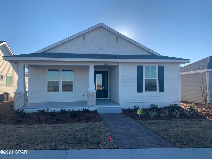 The Orchid model is an incredible open contemporary 3-bedroom / 2-bath floor plan. Granite countertops & stainless steel appliances give the kitchen a polished finish. Nice laundry room is off the kitchen. Features a living area off the large covered back porch and separate dining space. Large master suite with tray ceiling, double sinks, walk in tiled shower, linen closet, & walk-in closet. Great covered porches on the front of the home and the back. Many great design possibilities for your back yard space + fences allowed. Energy efficient & low insurance rates! Enjoy the sense of community at SweetBay with parks, amphitheater, resort swimming pool, basketball court, ponds, sidewalks and trail system that leads to North Bay! Top-rated K-8 University Academy is located within SweetBay!