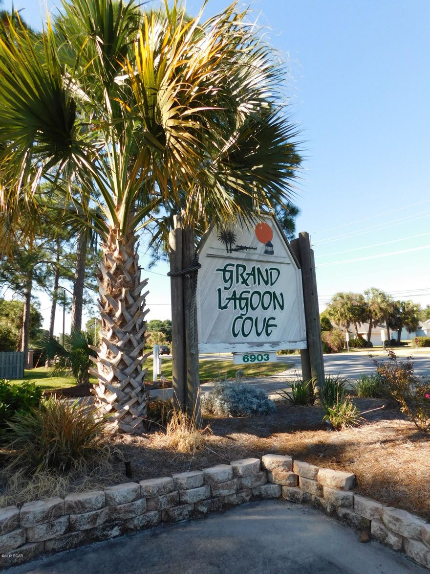 Check out this GREAT updated condo on Grand Lagoon. This unit offers 2 bedrooms and 2.5 baths with a peek a boo view of the lagoon from the master balcony. Sit outside on the back patio and enjoy a cup of coffee or relax on your balcony with a good book. The pool is right outside the back door if you get hot and want to cool off. Laundry hookup is inside and there is a storage room in the front under the carport. The seller has recently painted the unit throughout, updated fixtures and fans, replaced kitchen counter top, installed new A/C unit inside and out, installed new front door, replaced closet doors in master, installed new carpet, and all new appliances. The unit is ready for you to move in and add your personal touches. This complex has a lot to offer including fishing from the dock or beach, tennis, pool, community room and picnic area. And don't forget you can end your day watching the beautiful sunsets on the large deck by the water. Boat Slips are available on a first come, first serve basis. Contact HOA for information on availability. Currently the boat slips are $550+ $50 a year. Call your Realtor today to see this GREAT unit.