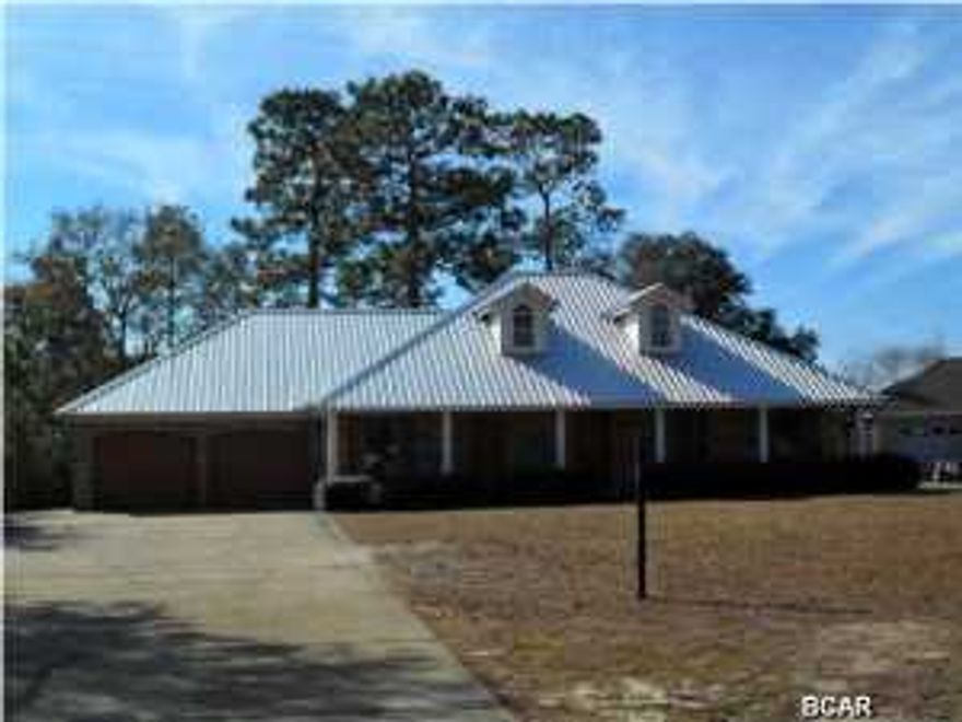 PRICE CHANGE***IT'S TIME TO GO FISHING!!!***AWESOME 3BED/2BATH LAKEFRONT HOME IN HIGH-END NEIGHBORHOOD ON DEER POINT LAKE***BRAND NEW METAL ROOF***ALL BRICK***BOATHOUSE WITH LIFT; DOCK WITH NEW DECKING; YOU CAN TIE UP ANOTHER BOAT ON THE END. ROOM AT THE END OF THE DOCK FOR SUNNING. Great views of Deer Point from Living Room, Breakfast, Kitchen, Master Bedroom, Huge Deck and Large Backyard. Giant kitchen/breakfast room. You will be surprised how large this home will live. You have to see this one. It's ready for you to move into and then get out there and find those fish!!!! All information and dimensions are estimates and if important should be verified by buyer before making and offer.