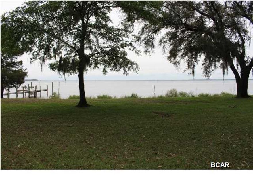 Bay Front property, one of the highest elevations in the area. Home is an original 1950's ranch with great potential. Alternative to renovation is development of the site with a new residence. Property is located North and East of FSU and Gulf Coast state College Campus. Unobstructed view of North Bay. This home is in good condition and ready for your imagination and updating. The lot has approximately 100 feet along North Bay and contains approximately .64 acres. Quiet neighborhood, but convenient to 23rd Street and all shopping and major traffic corridors. Property is sold in ''As Is'' condition. This property is a must see!!!