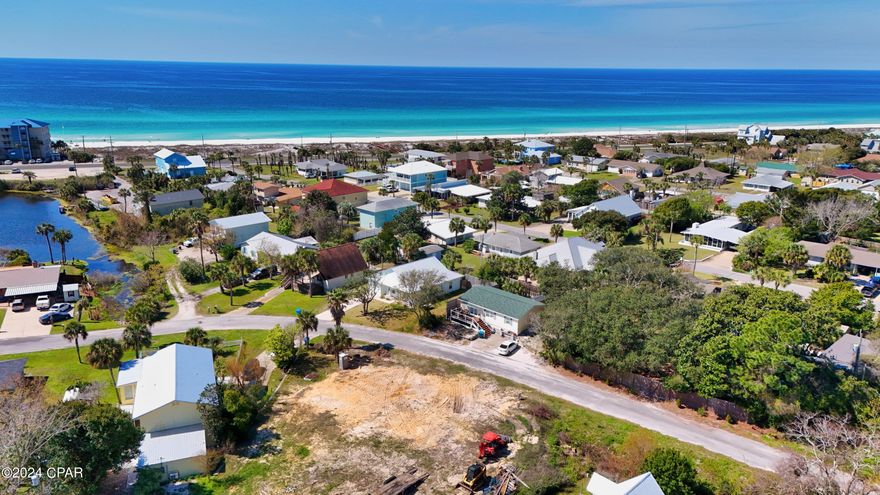 ********ONLINE AUCTION PROPERTY- JUNE 24TH-JULY16TH This property is under auction terms and conditions ONLINE BIDDING OPEN NOW.   LAGUNA BEACH - CUL-DE-SAC LOT A SHORT WALK TO THE BEACH. According to the seller a 3 story elevation would have a view of the gulf. Property Appraisers site shows the lot is  NOT IN FLOOD ZONE.  Build your dream home with potential gulf views and a short walk to the beach or if you are a investor, build them both lots out. Much site work has been done. Sewer is permitted and available.