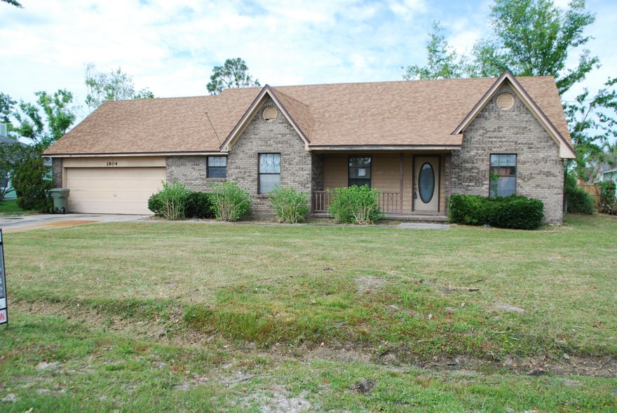 This 3 Bed 2 Bath located in North Ridge offers a great opportunity in the Lynn Haven area.  This split floor plan has a spacious kitchen with lots of cabinets, an open feel living space with vaulted ceiling and brick fireplace.  The master has two vanities and large walk in closet.  The roof was replaced after Hurricane Michael, there are still ceiling repairs to be made in the master bedroom and hall bath.  In addition the back screened in porch needs repair and the newer hot tub remains with the property.  It won't take much to get this one just the way you want or this may be a good house to invest with minimal repairs.  Call today