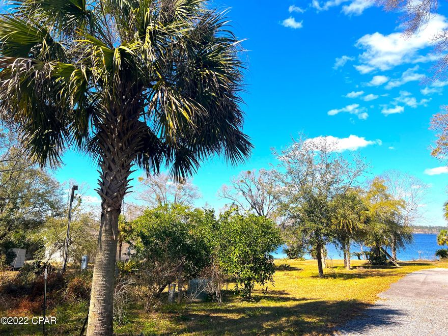 Come enjoy COMPASS LAKE! This lot is 1 block off the water and would be easy to build your cottage or small retirement home. Bring your fishing poles and enjoy the peace and quiet of this lovely community. Lot will need clearing and permits to build. Buyer to satisfy self to requirements.