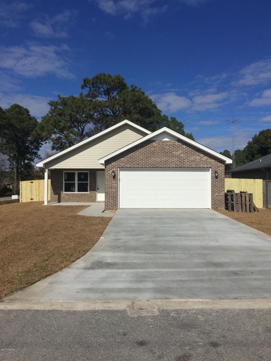 Fast growing neighborhood.  Tucked away in the heart of Panama City brand new 3 bedroom 2 bath home on a corner lot.  This home comes equipped with all the things new and retired homeowners are looking for.  Crown moldings, large walk in closet, with brick and vinly siding exterior. Neutral colors throughout to match your furniture much easier!  Kitchen has an island, great cabinets, cathedral ceiling in living room vinyl laminated flooring throughout.  Floor plans available. Fenced in corner lot with sidewalk in front. Completed now! Quaifies for  Rural Development