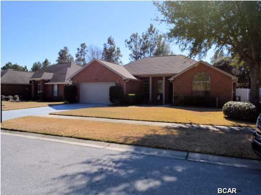 ''Practically Perfect in Every Way!'' best describes this exceptional Hammocks home. Meticulously maintained and cared for, this home is ''move-in'' ready to say the least. If you require four bedrooms and spacious living areas, then look no further. You'll appreciate how well the current owners have paid attention to the details of this beautiful home. This exceptional all brick home features custom kitchen cabinetry, tile flooring, and an inviting screen enclosed in ground pool. The home is situated on a quiet cul de sac of one of Lynn Haven's most popular subdivisions, The Hammocks, and is just minutes to shopping and the area's best schools. Upon entering the home you are met by a large foyer opening into the formal dining room and large living room with fireplace. Built on