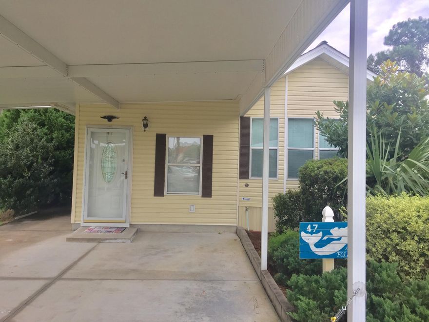 COME SEE THIS UNIT ON A CORNER LOT THAT BACKS UP TO WOODS FOR TOTAL PRIVACY. IT HAS 3 COVERED PARKING SPACES IN FRONT AND COVERED PATIO IN BACK. HAS STORAGE UNIT BEHIND UNIT WITH AIR COND AND SINK. COMPLETELY FURNISHED WITH TV'S AND ALL POTS/PAND AND DISHES AS WELL. ONE QUEEN BED IN BEDROOM, ONE QUEEN SOFA BED AND ONE TWIN LOVESEAT SOFA BED. YOU WILL LOVE THIS RESORT!!!!