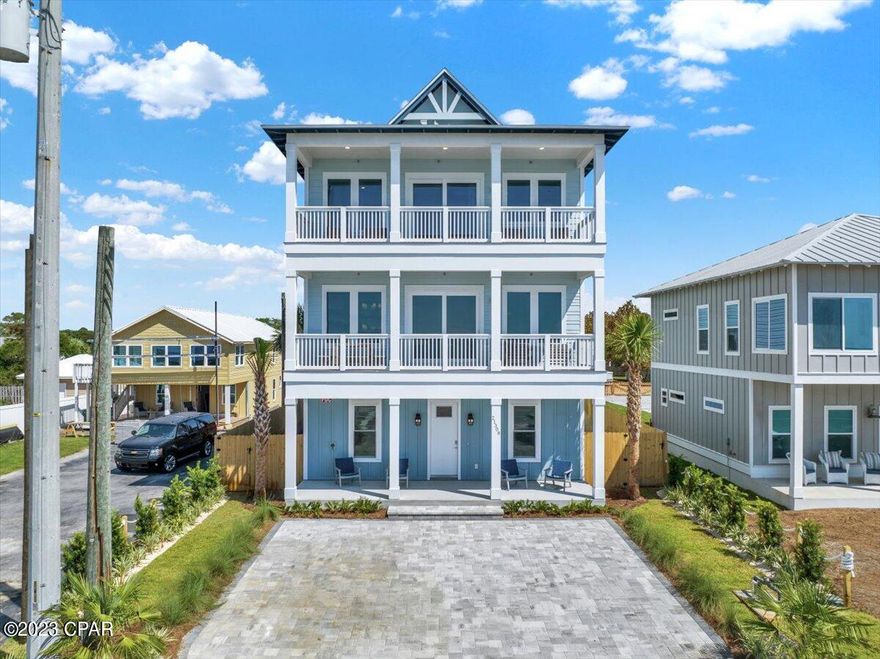 MAJOR PRICE CHANGE, OWNER SAID TO MOVE IT, Experience Unparalleled luxury, This Brand New exquisite 7-bedroom, 7-full bathroom (+2 half baths) vacation rental or primary residence is now ready to go.   Nestled on the tranquil West End of Panama City Beach, this Beach Retreat offers seamless access to the World's Most Beautiful Beaches with a dedicated Private Community Beach access just footsteps away. This Retreat on the exclusive West End has accommodations for up to 18 guests but that's not all, the house has an outdoor entertainment area that is just one-of-a-kind with an Outdoor Kitchen with built in Grill, Refrigerator, Ice Maker, and Bar.  The Pavilion area has a fireplace and outdoor T.V. along with Sound System as well as an oversize Pool, large decks for plenty of outdoor games and a Putting Green on an oversize 50 x 247 lot that will be roomy enough for Weddings, Corporate events or family reunions. The house is a fully furnished Beach House that is truly rental ready. Income models are available, and the property is already on rental program.