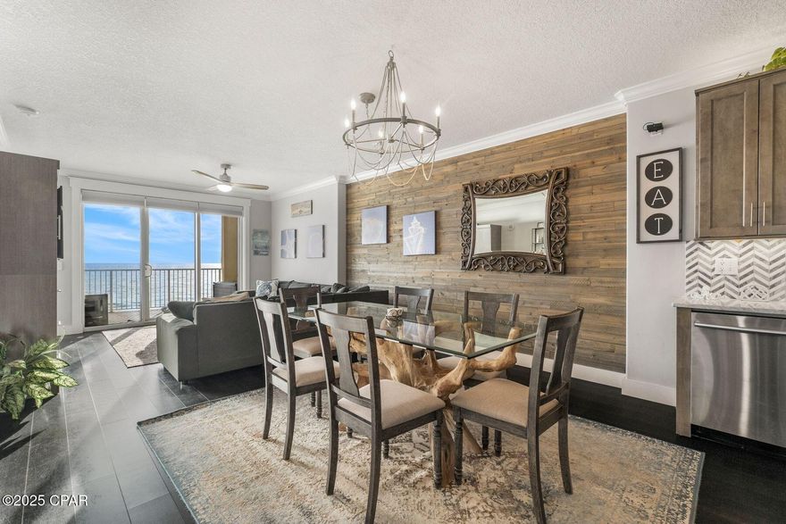 Experience refined coastal living in this beautifully appointed beachfront residence at Emerald Isle Resort, ideally located on the desirable west end of Panama City Beach. Just minutes from the premier shops and restaurants of Pier Park and a short drive to the scenic beauty of Highway 30A, this two-bedroom, two-bath condominium offers an elevated lifestyle defined by panoramic Gulf views and effortless elegance. An expansive, oversized balcony extends the living space outdoors, creating the perfect setting to enjoy spectacular sunsets over the emerald waters.

Inside, the residence is fully turnkey and thoughtfully designed with upscale finishes throughout. The custom kitchen features marble countertops, a center island, and a sleek induction cooktop, while solid interior doors and a tankless water heater speak to the home's attention to quality and detail. The Gulf-front primary suite opens directly to the balcony, offering tranquil water views and a spacious walk-in closet. Both functionality and convenience are enhanced by the inclusion of a washer and dryer within the unit. Whether envisioned as a luxurious personal retreat or a high-performing rental investment, this impeccably maintained residence captures the essence of sophisticated beachfront living on Florida's Emerald Coast.