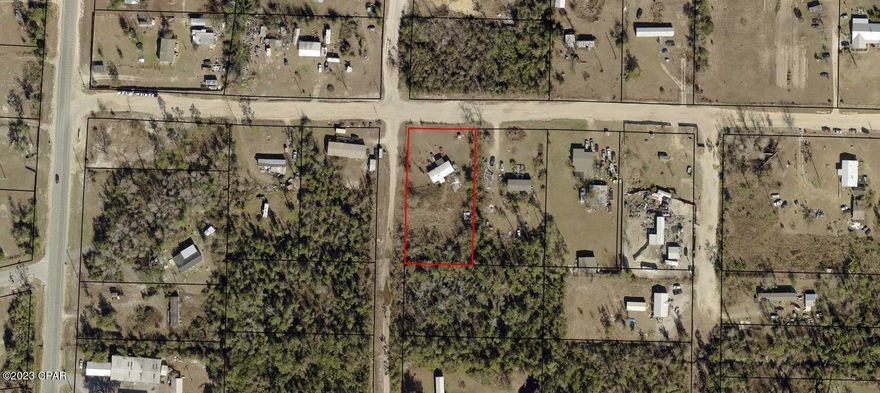 Great property on 1 acre and corner parcel.  Mobile home on site might be a teardown.  Price value based on Land.  Utilities in place with septic, well water and electricity.  Great parcel for Mobile Home/Land Package.  Stong sales in the area on mobile home sales.  Close to Highway 231. and Southport area.  Great price, make an offer.