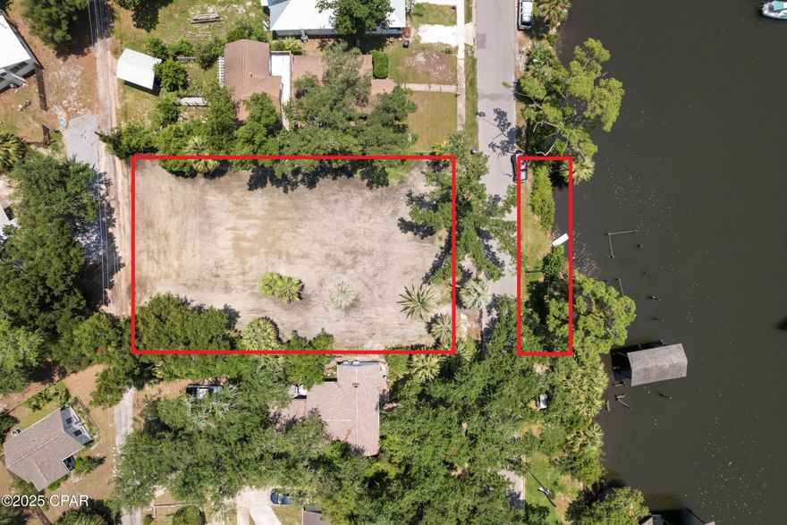 Discover the perfect canvas for your dream home on this cleared and build-ready residential waterfront lot located at 356 Massalina Dr. With breathtaking views and direct water access, this rare opportunity offers both serenity and convenience.
The spacious lot can be divided into two separate parcels, giving you the flexibility to build one large custom estate or two individual homes. All utilities are already in place, making the building process even smoother and more cost-effective. Call listing agent today for any questions.