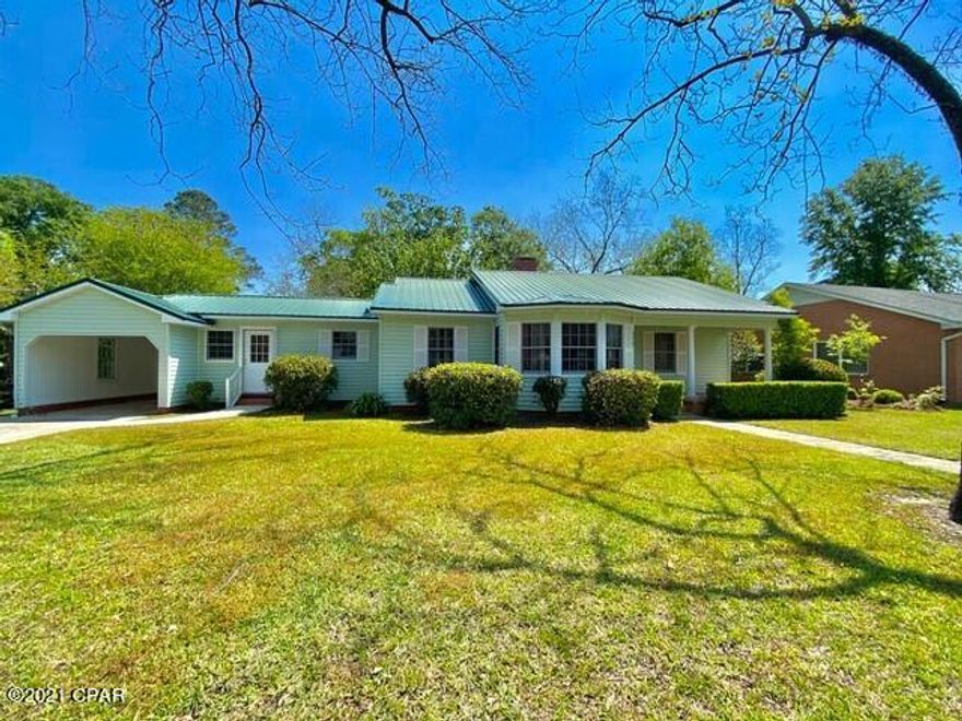 Motivated Sellers! Charming Chipley Home located in the historic district. This welcoming home features (refinished) hardwood floors throughout most of the home. It has a hobby room or office. Spacious living room in rear of home plus a Formal Living Room up front. Separate Dining room. Some rooms have real wood walls that give a rich glow. It has a  metal roof, central heating & a/c system, water heater and energy-efficient ceiling insulation. The kitchen has a stove/oven and dishwasher. For the cook, it offers plenty of workspace and a pantry closet. Front porch has a nice tile floor. It has a Single-Car Garage. The lawn and grounds are beautifully kept and have mature nut-bearing pecan trees, fig tree and other blooming flower plants.