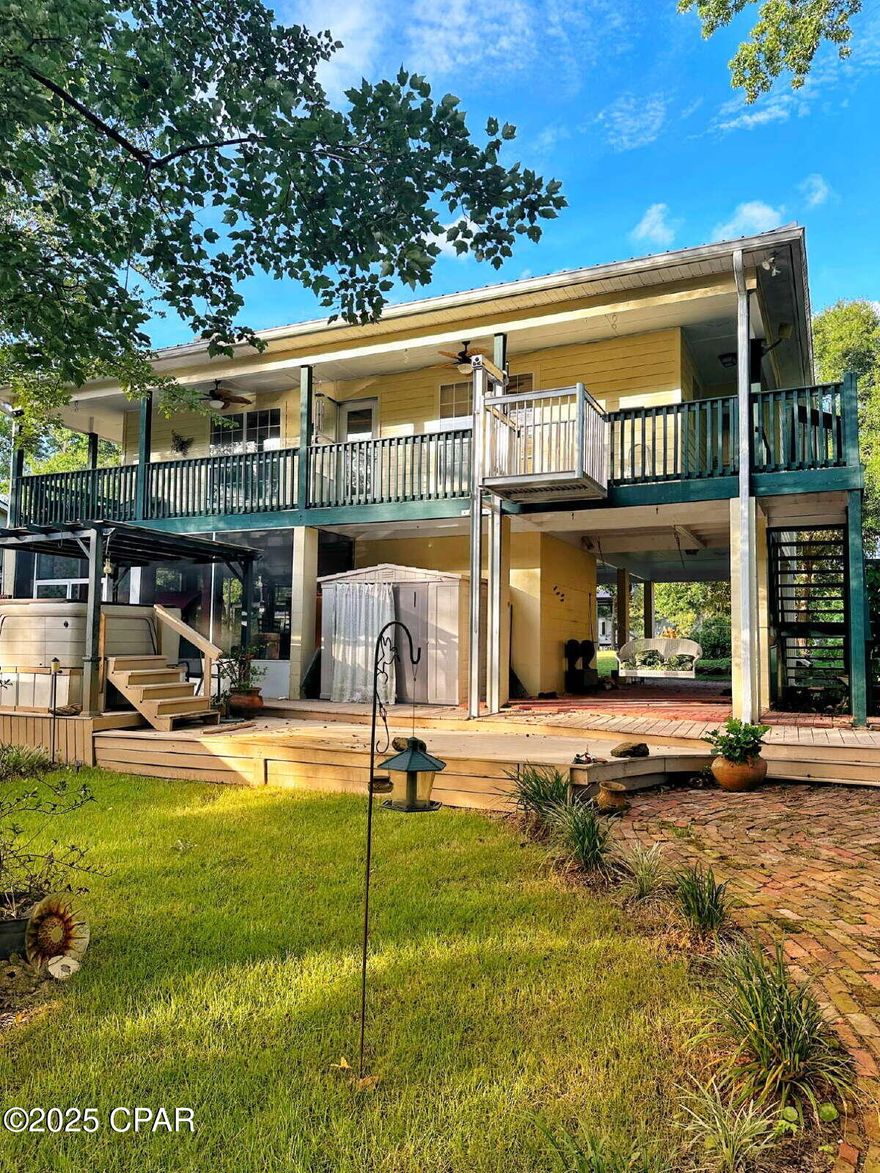 {WATERFRONT} Welcome to PARADISE on the Sister River!  This beautiful home will check all of your boxes if you are looking for a semi-remote location that offers peace and quiet, yet just 25 min from Pier Park & 15 min from Margaritaville!  The home is located in Steelfield Fishcamp on a clear stream that accesses the Sister River, which is about 4 miles from the Choctawhatchee River, which is another 8 miles from the Choctawhatchee Bay.  This offers a beautiful boat ride to the Intracoastal waterway, Eden State Park, The Bay restaurant at the foot of the 331 bridge and many many other gorgeous places, including fresh water springs that you can explore right from your backyard.  The home itself has never been rented.  It is a large 2 bedroom 2 bath home.  All living space is upstairs, but there is an elevator/lift if you don't like stairs. Downstairs offers a HUGE screened in porch area with a cook area and plenty of seating for your family gatherings.   The wrap-around porch will give you a beautiful view of the water each time you walk outside.  The home is equipped with all of the upgrades you would expect including granite countertops, custom cabinetry and stainless appliances in the kitchen.  A wood burning fireplace will warm your heart and your soul on those cold winter mornings.  The master bedroom is large with a french door to the wrap-around porch, and also features a master bath with double sinks, a large walk-in closet and a soaking tub, as well as a separate shower.  The second bedroom is ample size and also has a walk-in closet with an ensuite full bath.  This property is located about 25 min from Pier Park, also about 15 min from Latitude Margaritaville which is currently building a shopping center with a Publix and other stores that will be convenient to the location. The property is 9 miles from Hwy 79, and requires travel over 4 miles of unpaved roads to access the property - (see photo's), so it may not be appropriate if you do not have a vehicle that can tolerate dirt roads.  There is a hot tub that will stay on the property and will not be warranted with the Lease, but the owner will allow Tenants to use the hot tub as long as they maintain it.  The property is sparsely furnished as seen in the photo's.  Owner will remove any furnishings that the Tenant does not wish to use prior to occupancy.  Washer and Dryer are also available for use but not warranted.  This property is available now.  Please text a photo of your driver's license to our office number ending in 1673,  along with the name of the property that you are interested in and we will schedule your showing within 1 business day.  We apologize for  being cryptic about our phone number, it is likely on the web page you are viewing, but our MLS rules make this procedure LESS THAN ''user-friendly''.  Please do not fill out an application on any website until we send you the invite AFTER your showing.  Thank you.