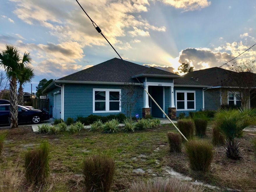 CURRENTLY UNDER CONTRACT, SELLER ACCEPTING BACKUP OFFERS. This beach home sits on a corner lot in one of the best beach neighborhoods. There are four bedrooms and two full baths, a large eat in kitchen with an adjacent family with tray ceilings. The counter tops are granite. There are numerous extras like a huge walk in pantry, even a butlers pantry. The exterior is wrapped with hardboard and the large back yard is privacy fenced. There are tons of new construction as well as homes being renovated and updated throughout this neighborhood. Septic Drain field location information in documents.