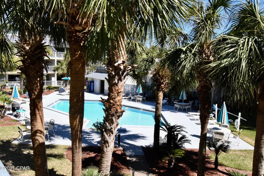 This beautifully updated one bedroom, one bath condo features an all new kitchen with granite and custom cabinetry, tiled throughout, an open floor plan, nice size kitchen, and living/dining area which leads to the large covered patio overlooking the central courtyard of the complex with swimming pool. Polywood deck furniture conveys. $1,500.00 appliance & drapery allowance. Located in the heart of Thomas Drive, Nautical Watch is a Gulf Front resort with easy beach access, bbq pit, seasonally heated pool, picnic area for it's owners and guests. Property Appraiser's site shows square footage at 626; however, previous comparable MLS listings shows square footage at 710. Buyer should measure to own satisfaction. Association has replaced the sliding glass door leading to patio