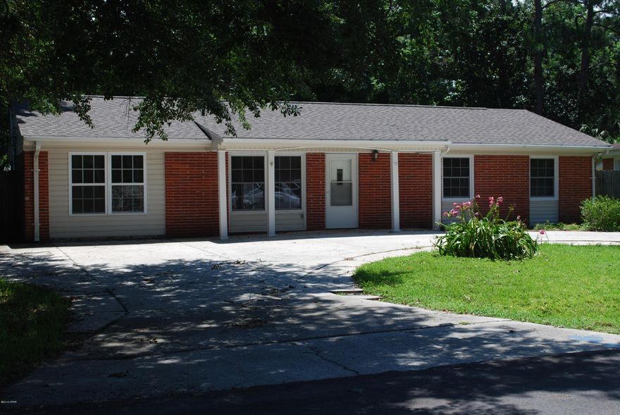 Lovely 3 bedroom 2 bath brick home with a large back yard is ready to move in today!  This open floor plan has decorator touches and fully updated so you don't have to.  Brand new roof 2018, new hot water heater in 2017, HVAC in 2017, Carpet and Paint in 2018, Appliances between 2012-2014.  The yard is lush and green with ample room in the fenced in back yard for entertaining around the firepit.  There is a large 15 x 20 workshop in the back with power and a covered space to park a boat or recreational vehicle.