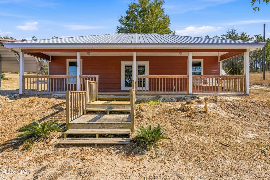 Tucked away in the peaceful countryside of Chipley, 4936 Long Lake Ridge offers a rare chance to own waterfront acreage inside a gated, horse-friendly community. This charming 2-bedroom, 2-bathroom home sits on an expansive 4.5-acre lot with beautiful water frontage, giving you the perfect blend of privacy, nature, and space to live the lifestyle you've been dreaming of. Both bedrooms are spacious primary suites, each with its own private bathroom, offering comfort and flexibility for owners and guests alike.

Whether you're looking for a serene full-time residence, a weekend retreat, or a place to bring your horses and enjoy the outdoors, this property delivers. The acreage provides plenty of room for riding, gardening, or simply enjoying wide-open views, while the waterfront setting creates a peaceful backdrop for morning coffee, fishing, or evening sunsets.

Opportunities like this in a gated equestrian community with true waterfront acreage are few and far between. If you've been waiting for space, privacy, and a unique setting, this is the one that doesn't come around often.