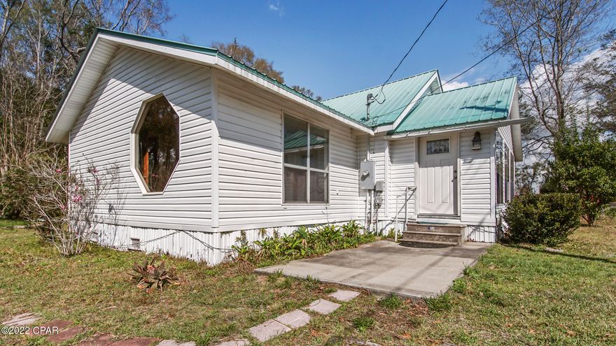 Remodeled, 3 Bedroom 2 Bath Corner Lot Home! This quaint home rests on just over 1/3 of an acre inside the City Limits of Bonifay. This Florida Cottage Style home with Front Porch Sunroom, features new flooring, new paint, new doors, new lighting, custom cabinetry, rustic shiplap accenting, and stainless steel appliances. The large, manicured corner lot features multiple flowering and fruit trees, and is large enough to be split for an additional building lot. This little gem of a property offers so much. Schedule your showing today!