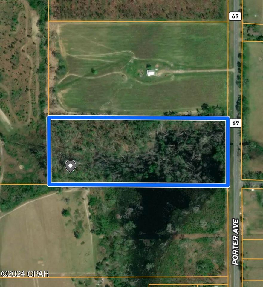 13.92 acres on Hwy 69 in Grand Ridge! This would be a great location to hunt or build a homesite out in the country! Only 15 minutes to Marianna, 45 minutes to Dothan, 1 hour to Tallahassee or Panama City! Country living at its finest!